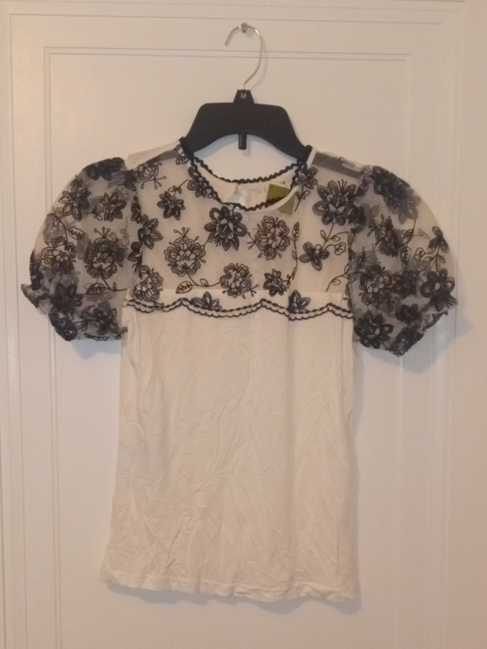 NWT women small white top with black lace shoulders